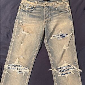Distressed Denim Jeans with Patterned Patches